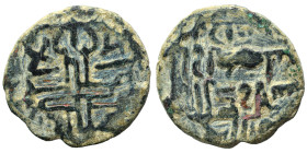 MENKUJAKIDS. Sulayman b. Ishaq, 1181. Fals (bronze, 4.12 g, 20 mm). Islamic legend, citing the Khaqanid ruler Akhsatan I. Rev. Ornamental cross with c...