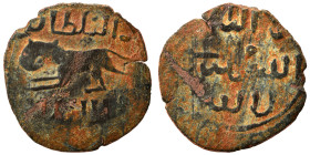 Mamluks. al-Zahir Rukn al-Din Baybars I, AH 658-676 / AD 1260-1277. Fals (bronze, 1.28 g, 18 mm), uncertain mint. Lion to left; below and above, legen...