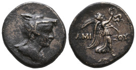 Greek
Pontos. Amisos circa 85-65 BC.
Bronze Æ
Bust of Amazon right, in wolf's scalp / [A]MI-ΣO[Y], Nike walking right, holding wreath in right hand, p...