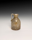 **Item description:** Assorted ancient Roman glass artifacts dating from 100 AD to 400 AD or later. These pieces feature various shapes and sizes typi...