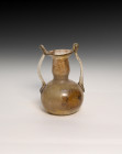 **Item description:** Assorted ancient Roman glass artifacts dating from 100 AD to 400 AD or later. These pieces feature various shapes and sizes typi...