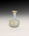 **Item description:** Assorted ancient Roman glass artifacts dating from 100 AD to 400 AD or later. These pieces feature various shapes and sizes typi...