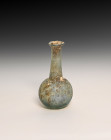 **Item description:** Assorted ancient Roman glass artifacts dating from 100 AD to 400 AD or later. These pieces feature various shapes and sizes typi...