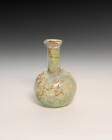 **Item description:** Assorted ancient Roman glass artifacts dating from 100 AD to 400 AD or later. These pieces feature various shapes and sizes typi...