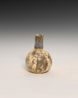 **Item description:** Assorted ancient Roman glass artifacts dating from 100 AD to 400 AD or later. These pieces feature various shapes and sizes typi...