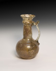 **Item description:** Assorted ancient Roman glass artifacts dating from 100 AD to 400 AD or later. These pieces feature various shapes and sizes typi...
