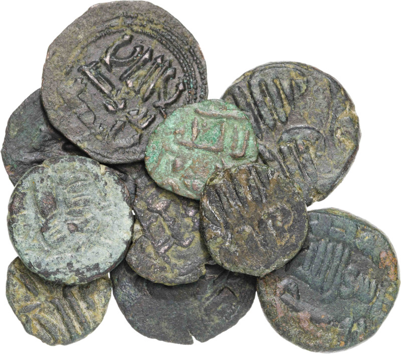 Lote de 10 feluses de al-Andalus, parcialmente legibles. Siete tipos distintos. ...