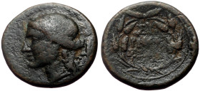 Sicily, Syracuse AE Bronze, 3.48g, 17mm) Roman rule (After 212 BC).
Obv: Wreathed head of Kore left; behind, dolphin downwards.
Rev: ΣYPAKOΣIΩN, Legen...