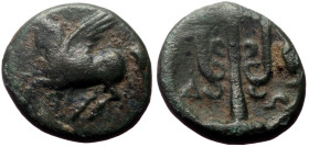 Corinthia, Corinth AE (Bronze, 1.66g, 12mm) ca 303-287 BC. 
Obv: Pegasos flying left; koppa below 
Rev: Trident-head upward; amphora to right, Δ-Ω acr...