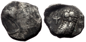 Attica, Athens AR Obol (Silver, 0.57g, 9mm) ca 450 BC. 
Obv: Head of Athena right, wearing Attic helmet, adorned with three olive leaves. 
Rev: ΑΘΕ, O...