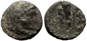 Kings of Macedon, Alexander III ‘the Great’ (336-323 BC) AE (Bronze, 1.32g, 12mm) Uncertain mint in Macedon, Lifetime issue. 
Obv: Head of Herakles ri...