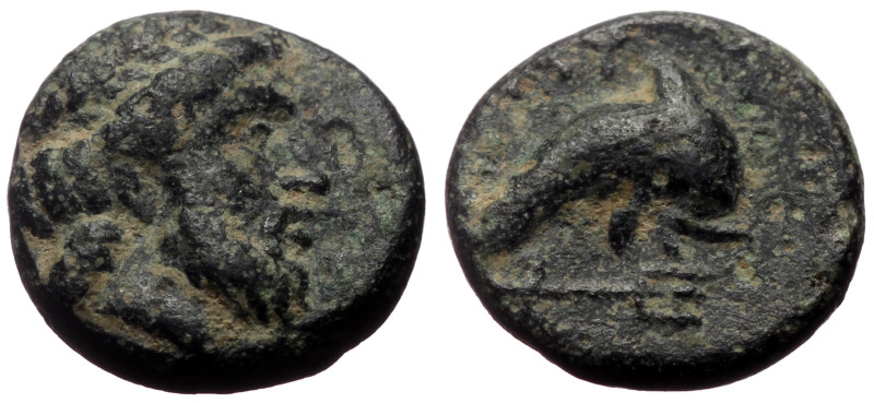 Caria, Nysiros AE (Bronze, 1.47g, 11mm) Mid 4th-late 3rd century BC.
Obv: Laurea...
