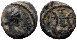 Syria, Seleucis and Pieria, Antioch (?) AE (Bronze, 0.86g, 9mm) Pseudo-autonomous issue, second half of 2nd century 
Obv: unreadable legend, laureate ...