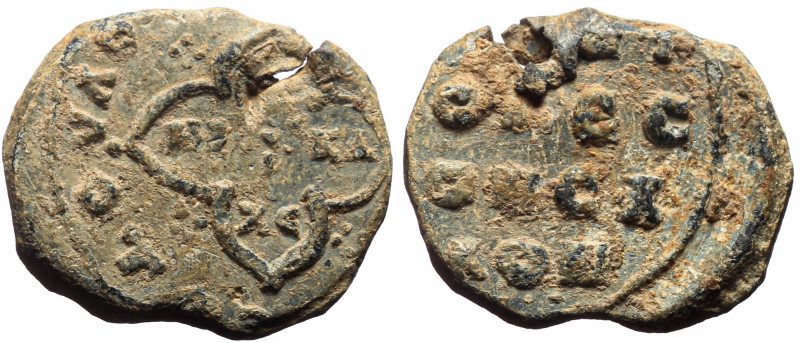 Byzantine Pb seal (4.36g, 19mm) N. Domestic of the Schools (tenth century).
Obv...