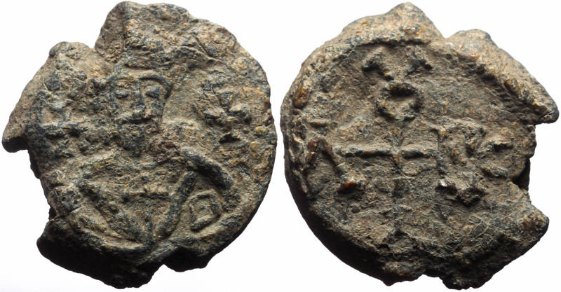 Nicholas -  Byzantine Pb seal (11.63g, 25mm) (six/seventh century).
Obverse: Bu...