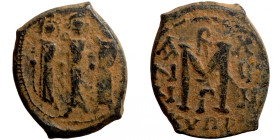 Byzantine bronze coin
18mm 6,37g
Artificial sand patina