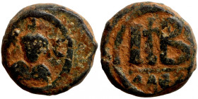 Byzantine bronze coin
17mm 9,67g
Artificial sand patina