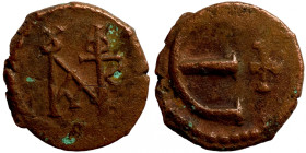 Byzantine bronze coin
13mm 1,41g
Artificial sand patina