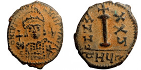 Byzantine bronze coin
18mm 4,60g
Artificial sand patina