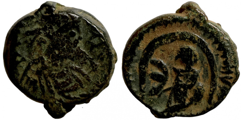 Byzantine bronze coin
11mm 2,04g
Artificial sand patina