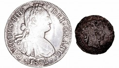 Monarquía Española
 Carlos IV
 8 Reales. AR. Méjico FT. 1802. Falsa de época o posterior. 26.36g. Porosidades y marcas de haber sido calentada. Se a...