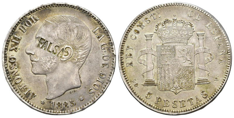 ALFONSO XII. 5 pesetas. 1885. Resello FALSA en anv. AR 26,47 g. 37,5 mm. MBC+.