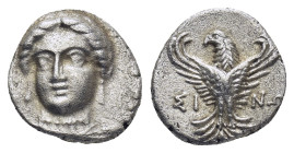 PAPHLAGONIA. Sinope. Trihemiobol (Circa 330-250 BC). (1.38 Gr. 11mm.)
 Head of nymph left, with hair in sakkos.
 Rev. Eagle facing, head left, wings d...