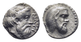CILICIA, Nagidos. Circa 400-380 BC. AR Obol (0.64 Gr. 9mm.).
 Bearded head of Dionysos right. 
Rev. Head of Pan right.