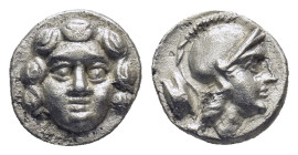 Pisidia. Selge circa 350-300 BC. Obol AR (1 Gr. 9mm.) 
Gorgoneion. 
Rev. Head of Athena to right, wearing crested Attic helmet; behind, astragalos.