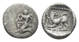 Caria. Uncertain mint circa 480-460 BC. Obol AR (8mm., 0,68 g). Naked winged male figure, in kneeling-running position to left, raising his right hand...