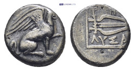 Ionia. Teos circa 320-294 BC. Lysan (ΛΥΣΑΝ), magistrate Diobol AR (1.09 Gr. 9mm.)
 Griffin seated right 
Rev. Lyre within square linear frame.