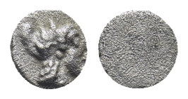 Asia Minor, Uncertain mint. Circa 5th. Century BC. AR Tetartemorion ( 0.16 Gr. 5mm.)