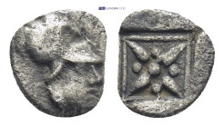 Asia Minor. Uncertain mint. AR Hemiobol, (0.4 g 6.0 mm). Circa 500-400 BC. Helmeted head of Athena right. Rev: Star of four rays, pellets between rays...