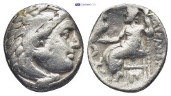 Kings of Macedon, Alexander III 'the Great', AR Drachm, .336-323 BC. Kolophon. (4.1 Gr. 16mm.)
 Head of Herakles right, wearing lion skin.
Rev. Zeus s...