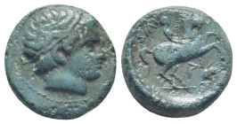 Kingdom of Macedon, Philip II Æ (16mm. 5.3 g) Uncertain Macedonian mint, circa 359-294 BC. Male head to right, wearing tainia / Youth on horseback to ...