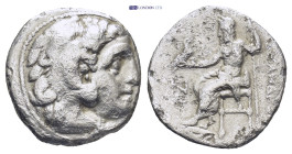 Kingdom of Macedon. Alexander III 'The Great' AR Drachm. circa 323-317 BC. (3.96 Gr. 16mm.)
Head of Herakles to right wearing lion skin 
Rev. Zeus sea...