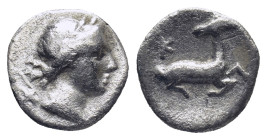 Ionia, Ephesos (?) AR Trihemiobol. Circa 340-325 BC. (1 Gr. 10mm.)
Draped bust of Artemis right, quiver at shoulder.
Rev. Stag kneeling right, head re...