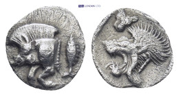 Mysia, Cyzicus, AR Hemiobol, 5th century BC. (0.36 Gr. 8mm.)
Forepart of boar left, tunny upward behind. 
Rev. Head of roaring lion left within square...