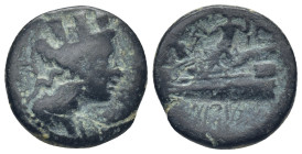 Phoenicia, Arados Æ (18mm, 5.5 g). Turreted and draped bust of Tyche to right, palm over shoulder / Poseidon seated to left on prow of galley, holding...