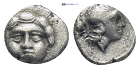 PISIDIA, Selge (Circa 350-300 BC) AR Obol (9mm, 0.9 g) Obv: Facing gorgoneion. Rev: Helmeted head of Athena to right; behind, astralagos.
