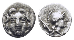PISIDIA. Selge. Obol (Circa 300-190 BC). (0.69 Gr. 9mm.)
 Gorgoneion.
 Rev. Helmeted head of Athena right, spear head behind.