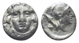 PISIDIA. Selge. Obol (Circa 300-190 BC). (0.7 Gr. 9mm.)
 Gorgoneion.
 Rev. Helmeted head of Athena right, spear head behind.