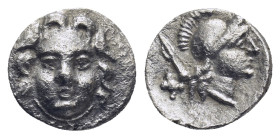 PISIDIA. Selge. Obol (Circa 300-190 BC). (0.84 Gr. 10mm.)
 Gorgoneion.
 Rev. Helmeted head of Athena right, spear head behind.