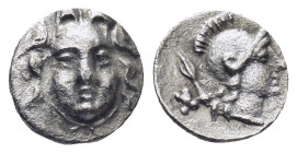 PISIDIA. Selge. Obol (Circa 300-190 BC). (0.91 Gr. 10mm.)
 Gorgoneion.
 Rev. Helmeted head of Athena right, spear head behind.