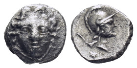PISIDIA. Selge. Obol (Circa 300-190 BC). (0.97 Gr. 10mm.)
 Gorgoneion.
 Rev. Helmeted head of Athena right, spear head behind.