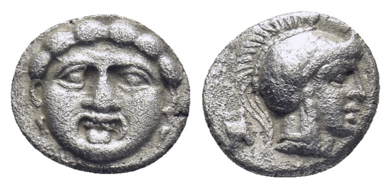 PISIDIA. Selge. Obol (Circa 300-190 BC). (1 Gr. 10mm.)
 Gorgoneion.
 Rev. Helmet...