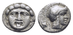 PISIDIA. Selge. Obol (Circa 300-190 BC). (1 Gr. 10mm.)
 Gorgoneion.
 Rev. Helmeted head of Athena right, spear head behind.