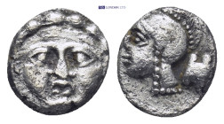 Pisidia, Selge. civic issue. Ca. 350-300 B.C. AR obol (10mm, 0.95 g). Facing Gorgoneion / Head of Athena left wearing crested Corinthian style helmet,...