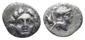 Pisidia. Selge circa 350-300 BC. Obol AR (0.85 Gr. 11mm.) 
Gorgoneion. 
Rev. Head of Athena to right, wearing crested Attic helmet; behind, astragalos...