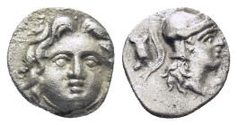 Pisidia. Selge circa 350-300 BC. Obol AR (0.87 Gr. 10mm.) 
Gorgoneion. 
Rev. Head of Athena to right, wearing crested Attic helmet; behind, astragalos...